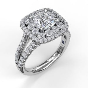 A halo split-shank engagement ring from Fana.