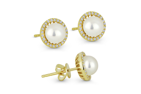 A pair of Madison pearl stud earrings within a yellow gold halo setting, available at Brockhaus Jewelry.