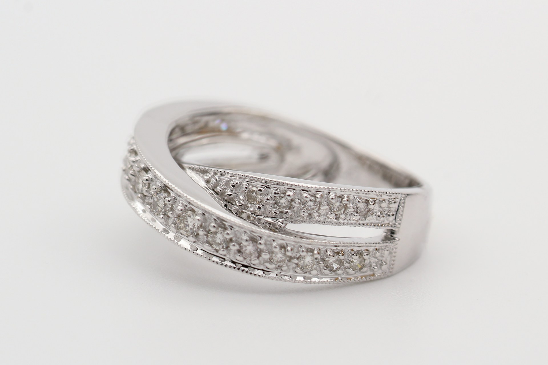 A close-up of a stunning white gold and diamond ring.